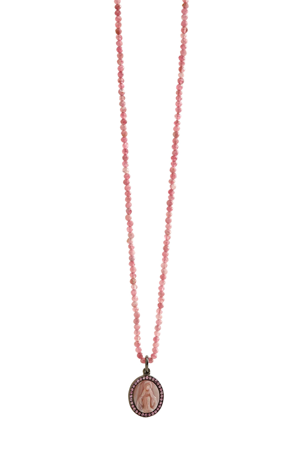 Necklace with pink beads and a pendant on a beige background
