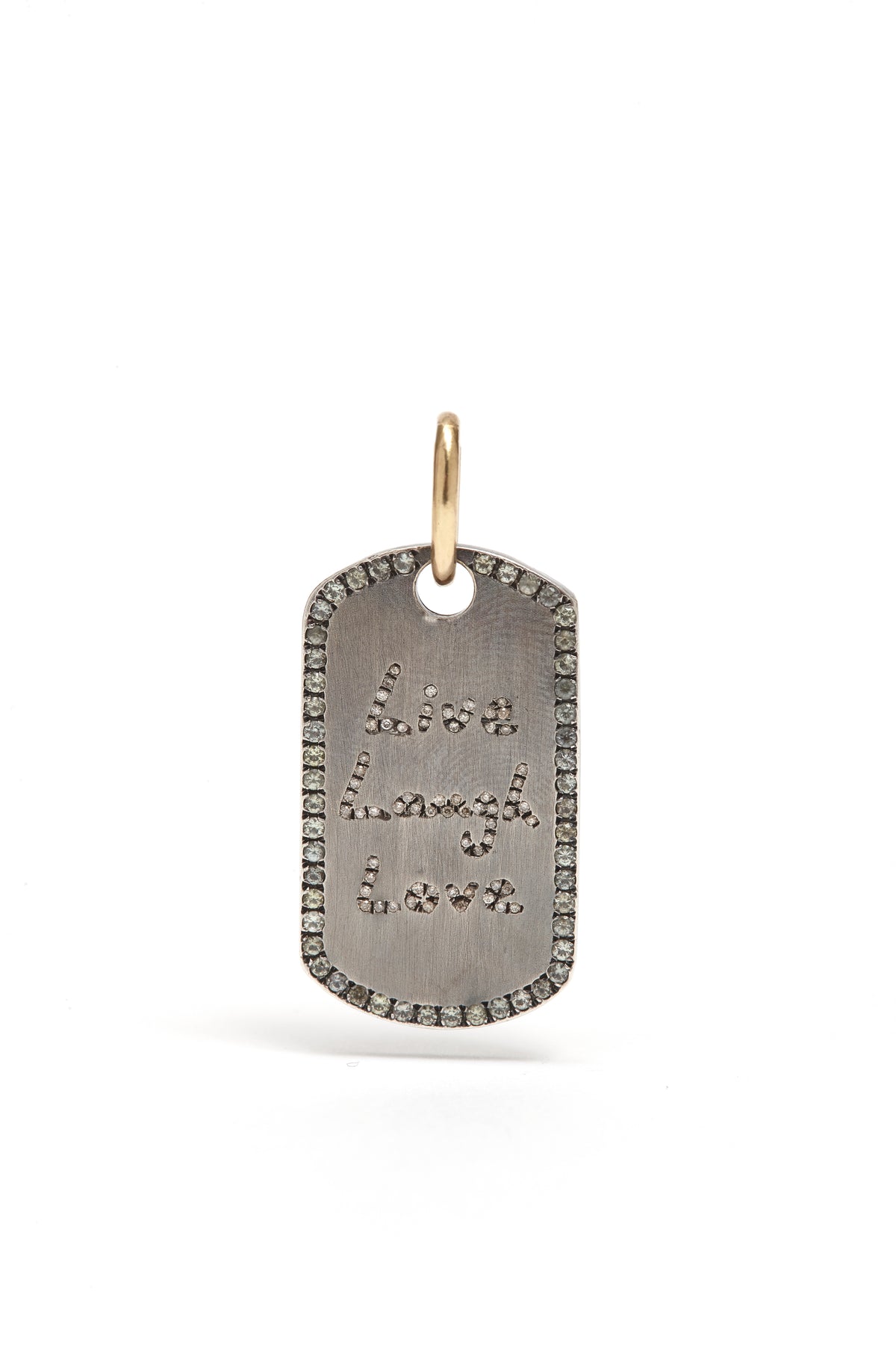 Silver dog tag pendant with engraved text on a white background