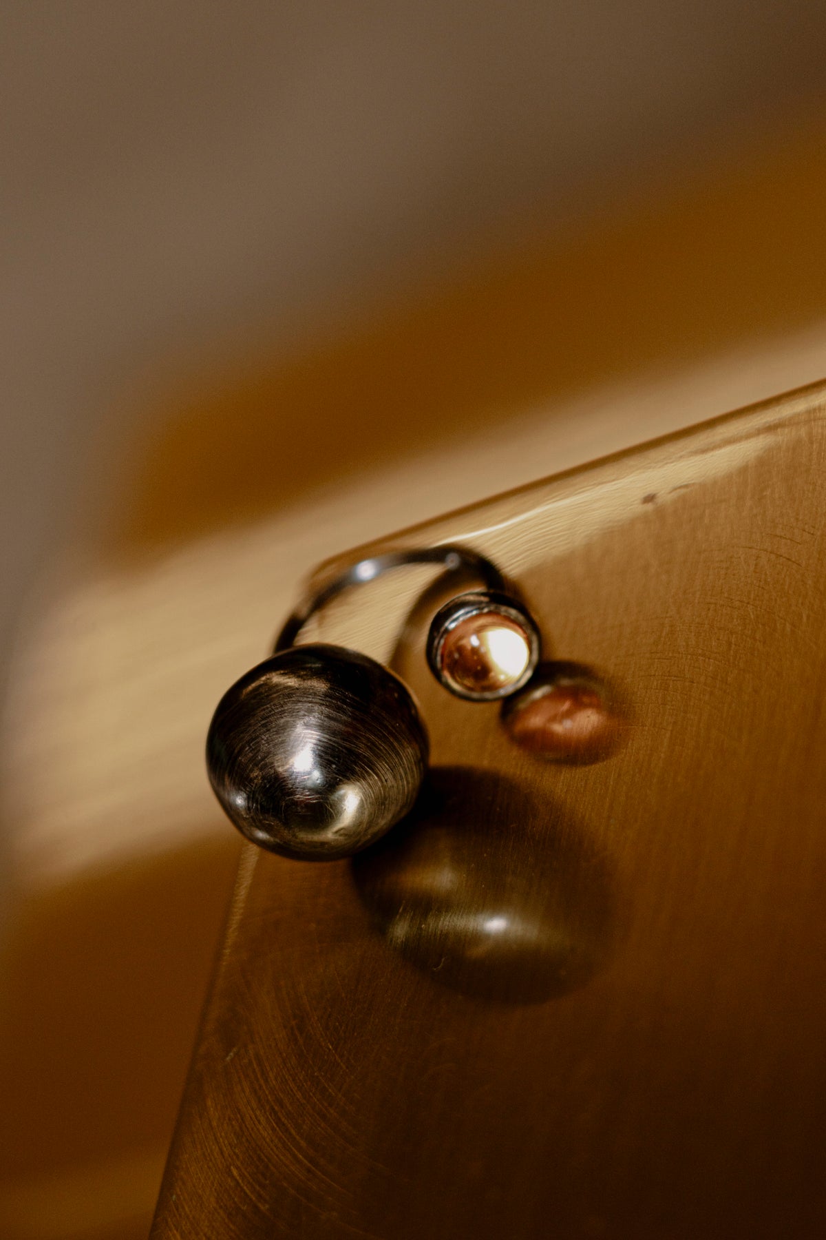 Close-up of a guitar with a focus on the tuning pegs.