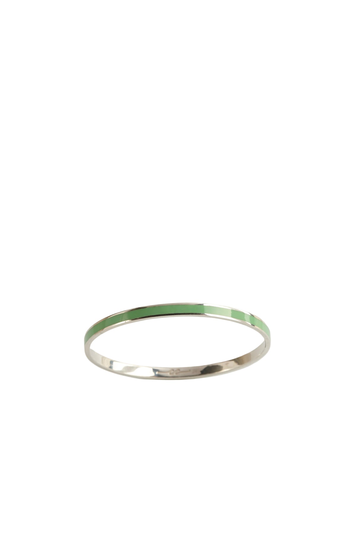 Silver ring on a light gray background