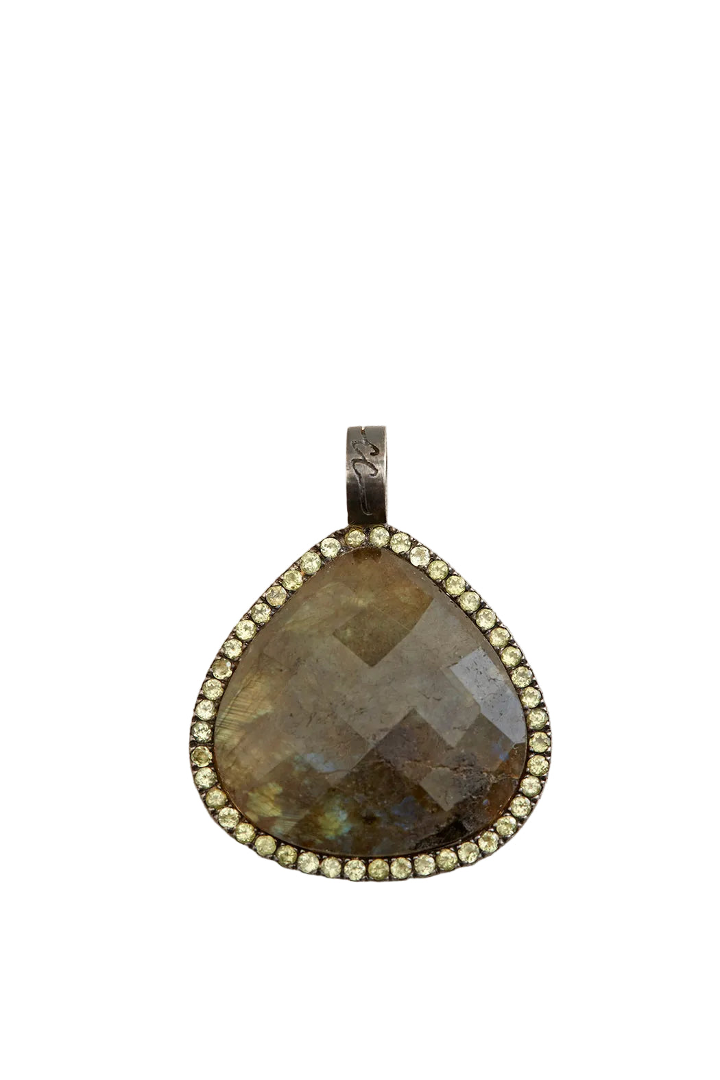 Teardrop-shaped pendant with faceted stone and bead border on a beige fabric background