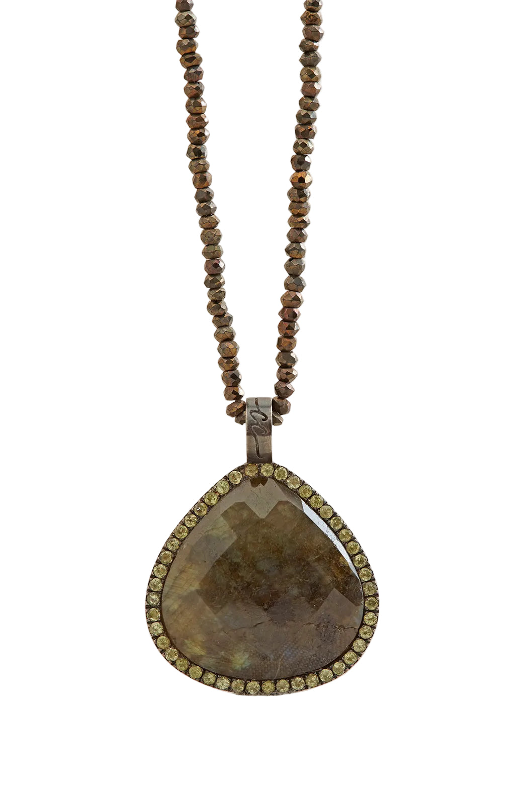 Necklace with a teardrop-shaped pendant on a beige background