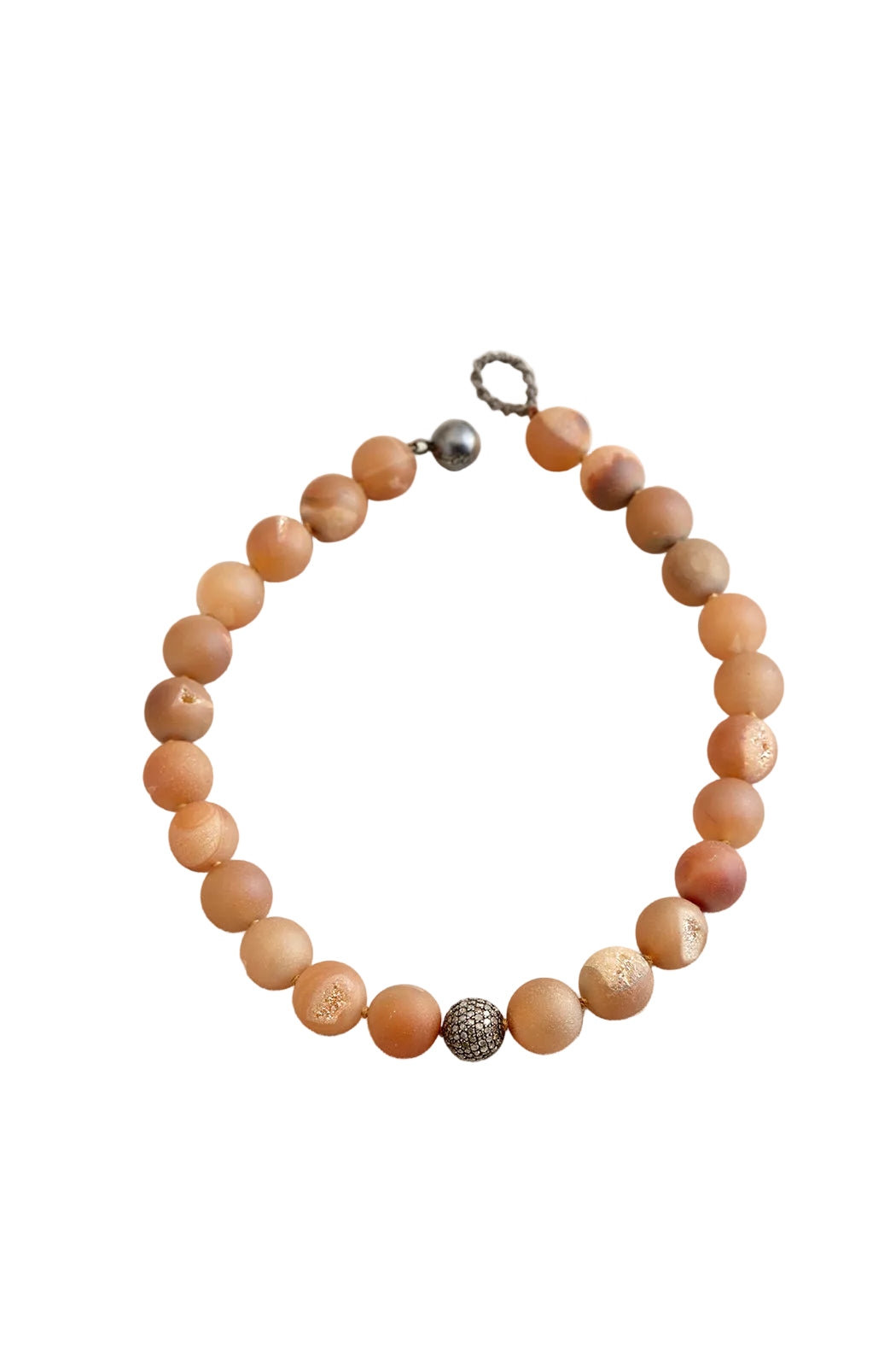 Beaded bracelet with a metal clasp on a white background