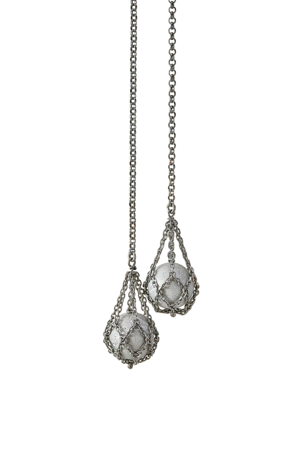 Pair of silver earrings with teardrop-shaped gemstones on a white background