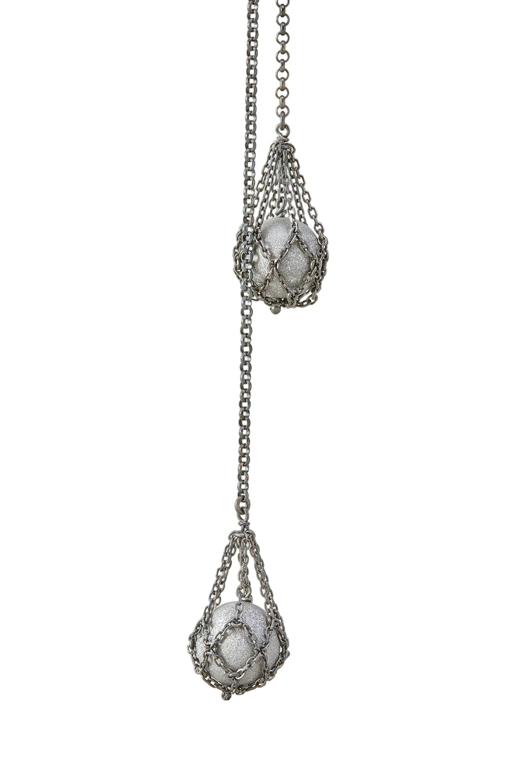 Necklace with three stone pendants on a white background