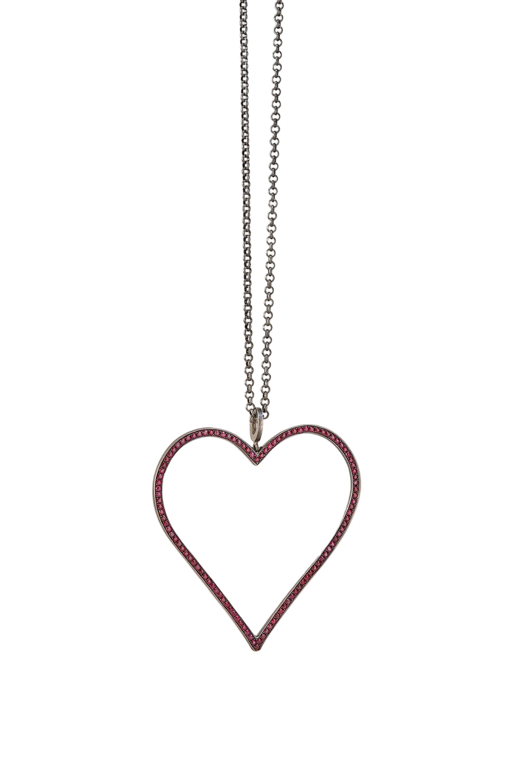 Heart-shaped pendant on a chain against a plain background