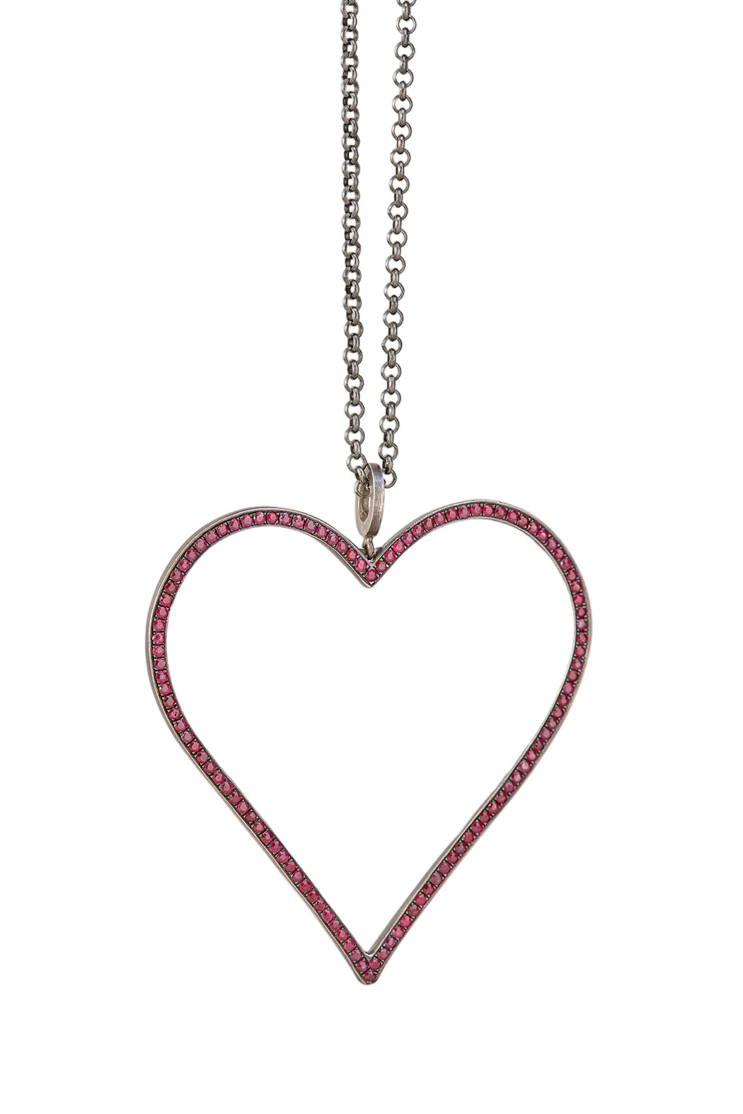 Heart-shaped pendant with red stones on a chain against a white background