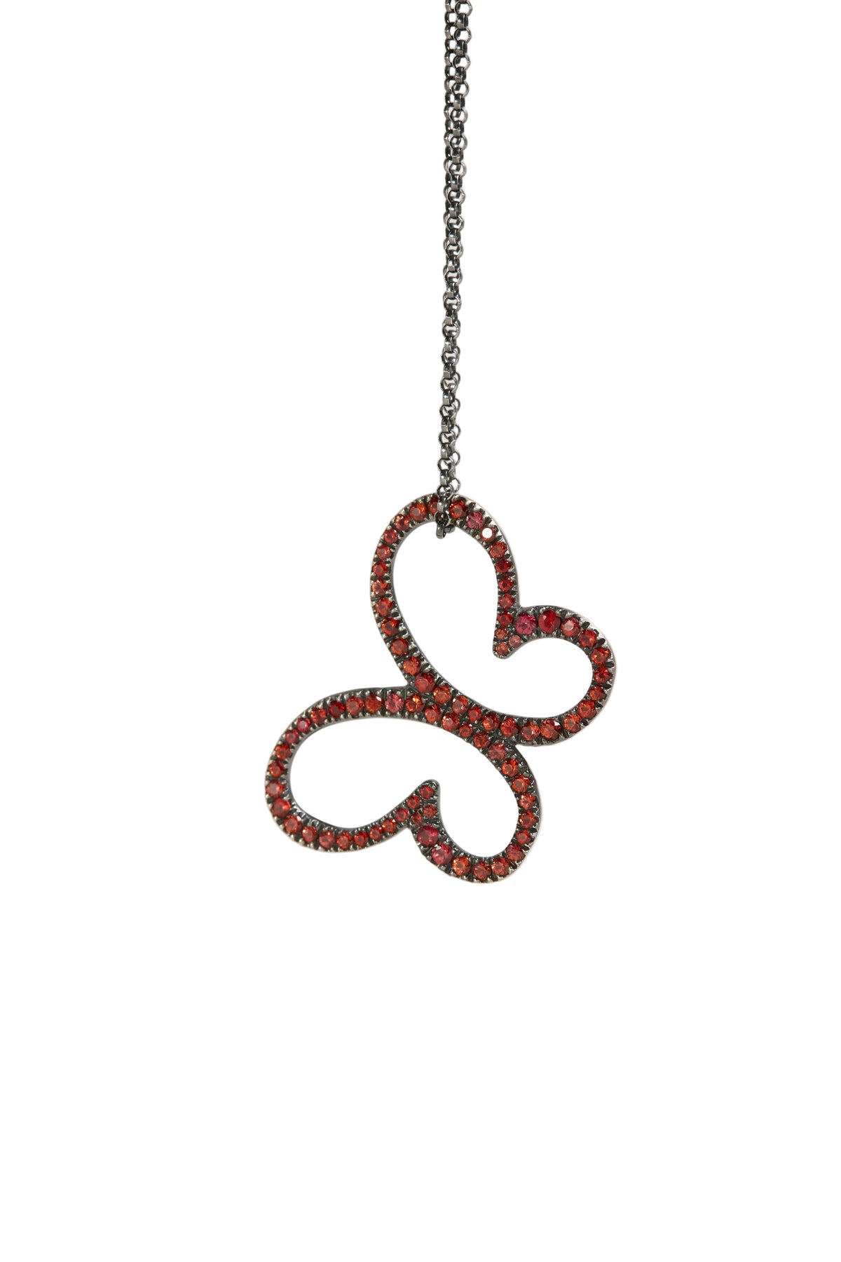 Jewelry pendant with chain on a light gray background