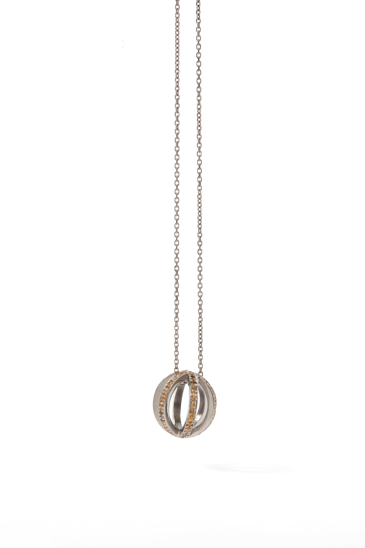 Silver necklace with a unique pendant on a white background