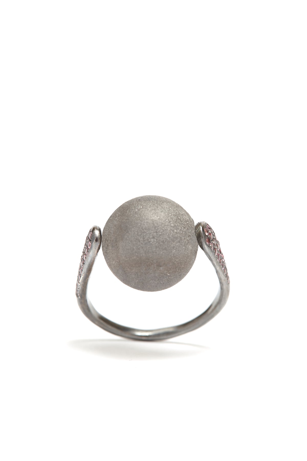 Silver ring with a textured ball on a white background